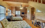 Loft Area Features Entertainment Area, and Two Twin Beds